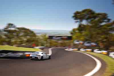 76;76;8-February-2013;Andreas-Baeneiger;Aston-Martin-Vantage-GT4;Australia;Bathurst;Bathurst-12-Hour;Chris-Porrit;Florian-Kaitelger;Grand-Tourer;Mt-Panorama;NSW;New-South-Wales;The-Dipper;auto;endurance;motion-blur;motorsport;racing;sky;wide-angle