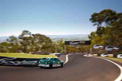 3;3;8-February-2013;Australia;Bathurst;Bathurst-12-Hour;Damien-Ward;Grand-Tourer;Holden-Astra-HSV-VXR;Ivo-Breukers;Morgan-Haber;Mt-Panorama;NSW;New-South-Wales;Racer-Industries;The-Dipper;auto;endurance;motion-blur;motorsport;racing;sky;wide-angle