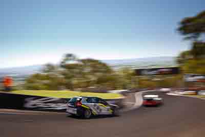 26;26;8-February-2013;Australia;BMW-130i;Bathurst;Bathurst-12-Hour;Daniel-Lewis;Daniel-Studdart;GWS-Personnel-Motorsport;Grand-Tourer;Jonathan-Venter;Mt-Panorama;NSW;New-South-Wales;The-Dipper;auto;endurance;motion-blur;motorsport;racing;sky;wide-angle