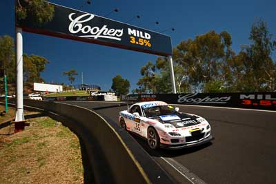 35;35;8-February-2013;Andrew-Bollom;Australia;Bathurst;Bathurst-12-Hour;Grand-Tourer;James-Parish;Mazda-RX‒7;Mazda-RX7;Mt-Panorama;NSW;New-South-Wales;Ric-Shaw;Ric-Shaw-Racing;Stephen-Borness;The-Dipper;auto;endurance;motorsport;racing;sky;wide-angle