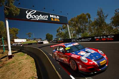 30;30;8-February-2013;Australia;Bathurst;Bathurst-12-Hour;Drew-Russell;Grand-Tourer;Hunter-Motorsports;Jonny-Reid;Mt-Panorama;NSW;New-South-Wales;Porsche-911-GT3-Cup-997;Steven-Johnson;The-Dipper;auto;endurance;motorsport;racing;sky;wide-angle