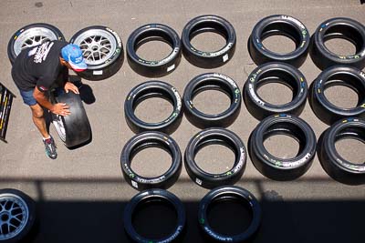 50mm;8-February-2013;Australia;Bathurst;Bathurst-12-Hour;Grand-Tourer;Mt-Panorama;NSW;New-South-Wales;atmosphere;auto;endurance;mechanic;motorsport;paddock;portrait;racing;tyres