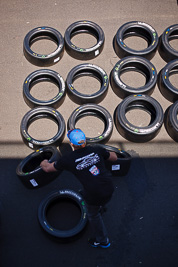 50mm;8-February-2013;Australia;Bathurst;Bathurst-12-Hour;Grand-Tourer;Mt-Panorama;NSW;New-South-Wales;atmosphere;auto;endurance;mechanic;motorsport;paddock;portrait;racing;tyres