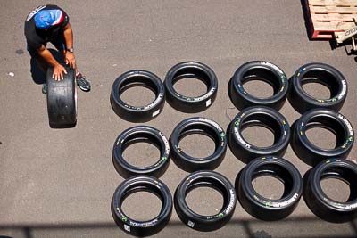 50mm;8-February-2013;Australia;Bathurst;Bathurst-12-Hour;Grand-Tourer;Mt-Panorama;NSW;New-South-Wales;atmosphere;auto;endurance;mechanic;motorsport;paddock;portrait;racing;tyres