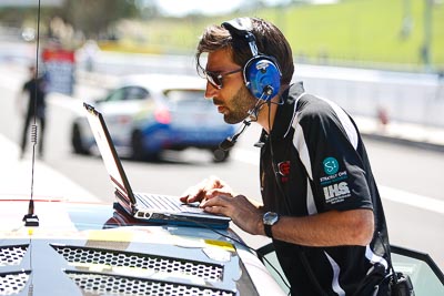 8-February-2013;Australia;Bathurst;Bathurst-12-Hour;GB-Galvanizing;Grand-Tourer;Mt-Panorama;NSW;New-South-Wales;atmosphere;auto;endurance;laptop;mechanic;motorsport;paddock;pitlane;portrait;racing;telephoto