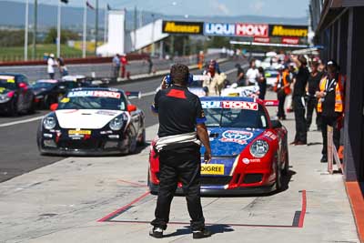 30;30;8-February-2013;Australia;Bathurst;Bathurst-12-Hour;David-Russell;Grand-Tourer;Hunter-Motorsports;Jonny-Reid;Mt-Panorama;NSW;New-South-Wales;Porsche-911-GT3-Cup-997;Steven-Johnson;atmosphere;auto;endurance;motorsport;paddock;pitlane;racing;telephoto