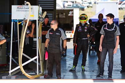 8-February-2013;Australia;Bathurst;Bathurst-12-Hour;Grand-Tourer;James-Winslow;Mt-Panorama;NSW;New-South-Wales;Peter-Conroy-Motorsport;atmosphere;auto;crew;endurance;fuel-man;fuel-station;group;motorsport;paddock;pitlane;portrait;racing;team;telephoto