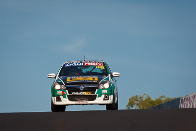 3;3;9-February-2013;Australia;Bathurst;Bathurst-12-Hour;Damien-Ward;Grand-Tourer;Holden-Astra-HSV-VXR;Ivo-Breukers;Morgan-Haber;Mt-Panorama;NSW;New-South-Wales;Racer-Industries;auto;endurance;motorsport;racing;sky;super-telephoto