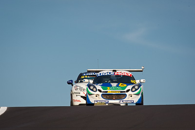 60;60;9-February-2013;Australia;Bathurst;Bathurst-12-Hour;Ben-Gower;Grand-Tourer;Lotus-Elise;Motionsport;Mt-Panorama;NSW;New-South-Wales;Pete-Storey;Simon-Phillips;auto;endurance;motorsport;racing;sky;super-telephoto