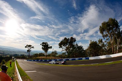 2;27;2;27;9-February-2013;Allan-Shephard;Australia;BMW-130i;Bathurst;Bathurst-12-Hour;Dylan-Thomas;Grand-Tourer;Jake-Camilleri;Justin-Garioch;Keith-Kassulke;Mt-Panorama;NSW;New-South-Wales;Opel-Astra-VXR;Racer-Industries;Ryan-McLeod;The-Shire-Conveyancer;auto;clouds;endurance;fisheye;motorsport;racing;sky