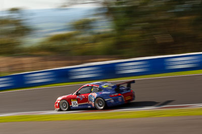 30;30;9-February-2013;Australia;Bathurst;Bathurst-12-Hour;Drew-Russell;Grand-Tourer;Hunter-Motorsports;Jonny-Reid;Mt-Panorama;NSW;New-South-Wales;Porsche-911-GT3-Cup-997;Steven-Johnson;The-Esses;auto;endurance;motion-blur;motorsport;racing;telephoto