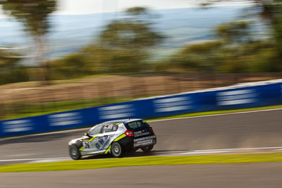 26;26;9-February-2013;Australia;BMW-130i;Bathurst;Bathurst-12-Hour;Daniel-Lewis;Daniel-Studdart;GWS-Personnel-Motorsport;Grand-Tourer;Jonathan-Venter;Mt-Panorama;NSW;New-South-Wales;The-Esses;auto;endurance;motion-blur;motorsport;racing;telephoto