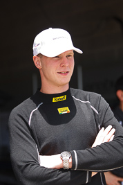 9-February-2013;Australia;Bathurst;Bathurst-12-Hour;Grand-Tourer;Johan-Kristoffersson;Mt-Panorama;NSW;New-South-Wales;Phoenix-Racing;atmosphere;auto;endurance;motorsport;paddock;pitlane;portrait;racing;telephoto