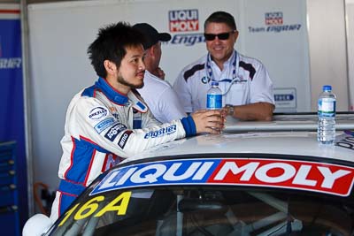 9-February-2013;Australia;Bathurst;Bathurst-12-Hour;Charles-Ng;Grand-Tourer;LIQUI-MOLY-Team-Engstler;Mt-Panorama;NSW;New-South-Wales;atmosphere;auto;endurance;motorsport;paddock;pitlane;portrait;racing;telephoto