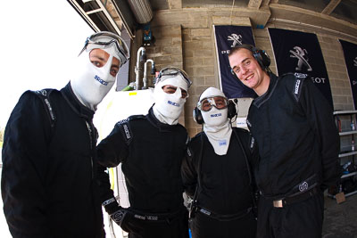 9-February-2013;Australia;Bathurst;Bathurst-12-Hour;Grand-Tourer;Mt-Panorama;NSW;New-South-Wales;Team-Peugeot-RCZ;atmosphere;auto;crew;endurance;fisheye;group;mechanics;motorsport;paddock;pitlane;portrait;racing;team