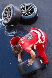 9-February-2013;Australia;Bathurst;Bathurst-12-Hour;Clearwater-Racing;Grand-Tourer;Mt-Panorama;NSW;New-South-Wales;atmosphere;auto;clean;endurance;mechanic;motorsport;paddock;portrait;racing;telephoto;tyres;was;wheels