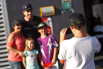 9-February-2013;Australia;Bathurst;Bathurst-12-Hour;Craig-Lowndes;Grand-Tourer;Mt-Panorama;NSW;New-South-Wales;Skwirk-Oneworld-Bar;atmosphere;auto;child;endurance;fans;kids;motorsport;paddock;racing;spectators;telephoto