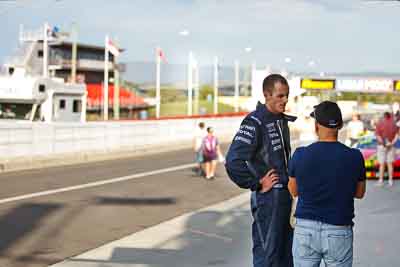 9-February-2013;Australia;Bathurst;Bathurst-12-Hour;David-Wall;Grand-Tourer;Mt-Panorama;NSW;New-South-Wales;Team-Peugeot-RCZ;atmosphere;auto;endurance;motorsport;paddock;portrait;racing;telephoto