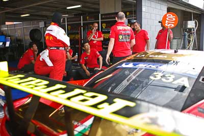 33;28mm;33;9-February-2013;Australia;Bathurst;Bathurst-12-Hour;Clearwater-Racing;Ferrari-458-Italia-GT3;Grand-Tourer;Mt-Panorama;NSW;New-South-Wales;atmosphere;auto;crew;endurance;group;mechanics;motorsport;paddock;pitlane;racing;team