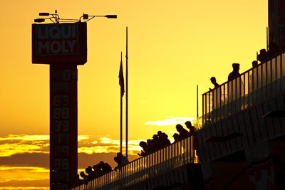 10-February-2013;Australia;Bathurst;Bathurst-12-Hour;Grand-Tourer;Mt-Panorama;NSW;New-South-Wales;atmosphere;auto;backlight;building;endurance;fans;morning;motorsport;pitlane;racing;spectators;sun;sunrise;super-telephoto;tower