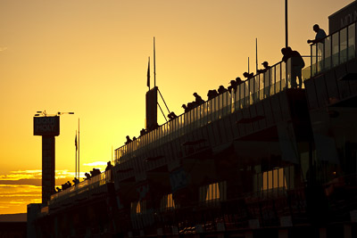 10-February-2013;Australia;Bathurst;Bathurst-12-Hour;Grand-Tourer;Mt-Panorama;NSW;New-South-Wales;atmosphere;auto;backlight;building;endurance;fans;morning;motorsport;pitlane;racing;spectators;sun;sunrise;telephoto;tower