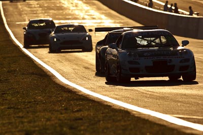 35;10-February-2013;35;Andrew-Bollom;Australia;Bathurst;Bathurst-12-Hour;Grand-Tourer;James-Parish;Mazda-RX‒7;Mazda-RX7;Mt-Panorama;NSW;New-South-Wales;Ric-Shaw;Ric-Shaw-Racing;Stephen-Borness;auto;backlight;endurance;morning;motorsport;racing;sunrise;super-telephoto