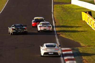 76;10-February-2013;76;Andreas-Baeneiger;Aston-Martin-Vantage-GT4;Australia;Bathurst;Bathurst-12-Hour;Chris-Porrit;Florian-Kaitelger;Grand-Tourer;Hell-Corner;Mt-Panorama;NSW;New-South-Wales;auto;endurance;morning;motorsport;racing;super-telephoto