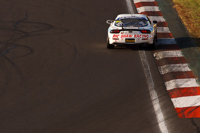 35;10-February-2013;35;Andrew-Bollom;Australia;Bathurst;Bathurst-12-Hour;Grand-Tourer;Hell-Corner;James-Parish;Mazda-RX‒7;Mazda-RX7;Mt-Panorama;NSW;New-South-Wales;Ric-Shaw;Ric-Shaw-Racing;Stephen-Borness;auto;endurance;morning;motorsport;racing;super-telephoto