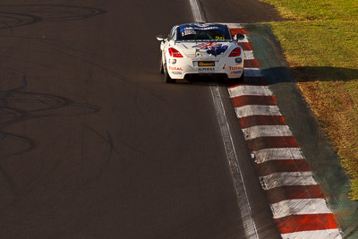 20;10-February-2013;20;Australia;Bathurst;Bathurst-12-Hour;Grand-Tourer;Hell-Corner;Mt-Panorama;NSW;New-South-Wales;Peugeot-RCZ-Cup;Stephane-Caillet-Bright;Team-Peugeot-RCZ;auto;endurance;morning;motorsport;racing;super-telephoto