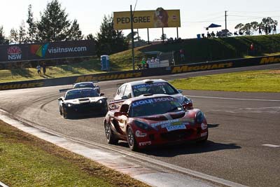 62;10-February-2013;62;Australia;Bathurst;Bathurst-12-Hour;Grand-Tourer;Laim-Talbot;Lotus-Exige-S;Mt-Panorama;Murrays-Corner;NSW;New-South-Wales;Robert-Thomson;Romano-Sartori;auto;endurance;motorsport;racing;telephoto