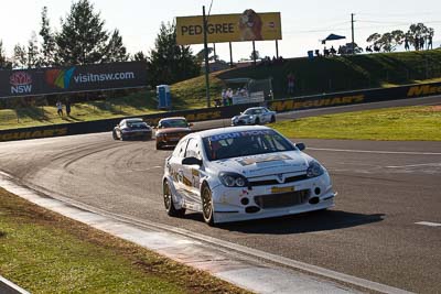 2;10-February-2013;2;Australia;Bathurst;Bathurst-12-Hour;Grand-Tourer;Jake-Camilleri;Keith-Kassulke;Mt-Panorama;Murrays-Corner;NSW;New-South-Wales;Opel-Astra-VXR;Racer-Industries;Ryan-McLeod;auto;endurance;motorsport;racing;telephoto