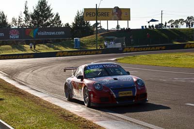 30;10-February-2013;30;Australia;Bathurst;Bathurst-12-Hour;Drew-Russell;Grand-Tourer;Hunter-Motorsports;Jonny-Reid;Mt-Panorama;Murrays-Corner;NSW;New-South-Wales;Porsche-911-GT3-Cup-997;Steven-Johnson;auto;endurance;motorsport;racing;telephoto