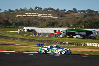 60;10-February-2013;60;Australia;Bathurst;Bathurst-12-Hour;Ben-Gower;Grand-Tourer;Lotus-Elise;Motionsport;Mt-Panorama;Murrays-Corner;NSW;New-South-Wales;Pete-Storey;Simon-Phillips;auto;endurance;motorsport;racing;telephoto