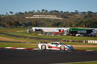 51;10-February-2013;51;Andrew-MacPherson;Australia;Bathurst;Bathurst-12-Hour;Ben-Porter;Garth-Walden;Grand-Tourer;IMAKKWIKMIT;Mosler-MT900-GT3;Mt-Panorama;Murrays-Corner;NSW;New-South-Wales;auto;endurance;motorsport;racing;telephoto