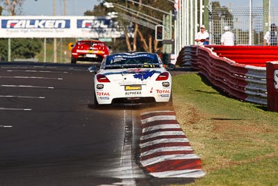 21;10-February-2013;21;Andrew-Jones;Australia;Bathurst;Bathurst-12-Hour;Bruce-Jouanny;David-Wall;Grand-Tourer;Mt-Panorama;Murrays-Corner;NSW;New-South-Wales;Peugeot-RCZ-Cup;Team-Peugeot-RCZ;auto;endurance;motorsport;racing;super-telephoto