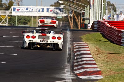 51;10-February-2013;51;Andrew-MacPherson;Australia;Bathurst;Bathurst-12-Hour;Ben-Porter;Garth-Walden;Grand-Tourer;IMAKKWIKMIT;Mosler-MT900-GT3;Mt-Panorama;Murrays-Corner;NSW;New-South-Wales;auto;endurance;motorsport;racing;super-telephoto