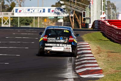 26;10-February-2013;26;Australia;BMW-130i;Bathurst;Bathurst-12-Hour;Daniel-Lewis;Daniel-Studdart;GWS-Personnel-Motorsport;Grand-Tourer;Jonathan-Venter;Mt-Panorama;Murrays-Corner;NSW;New-South-Wales;auto;endurance;motorsport;racing;super-telephoto