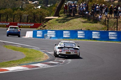 35;10-February-2013;35;Andrew-Bollom;Australia;Bathurst;Bathurst-12-Hour;Grand-Tourer;James-Parish;Mazda-RX‒7;Mazda-RX7;Mt-Panorama;NSW;New-South-Wales;Ric-Shaw;Ric-Shaw-Racing;Stephen-Borness;The-Esses;auto;endurance;motorsport;racing;telephoto