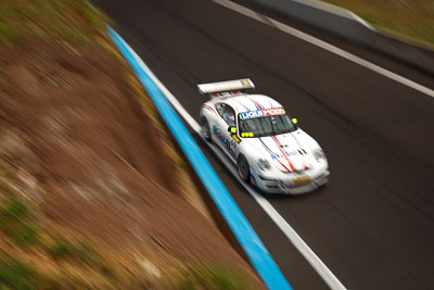 69;10-February-2013;69;Allan-Dippie;Australia;Bathurst;Bathurst-12-Hour;Forrests-Elbow;George-McFarlane;Grand-Tourer;Motorsport-Services;Mt-Panorama;NSW;New-South-Wales;Porsche-911-GT3-Cup-997;Scott-ODonnell;auto;endurance;motion-blur;motorsport;racing;wide-angle