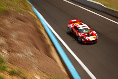 62;10-February-2013;62;Australia;Bathurst;Bathurst-12-Hour;Forrests-Elbow;Grand-Tourer;Laim-Talbot;Lotus-Exige-S;Mt-Panorama;NSW;New-South-Wales;Robert-Thomson;Romano-Sartori;auto;endurance;motion-blur;motorsport;racing;wide-angle