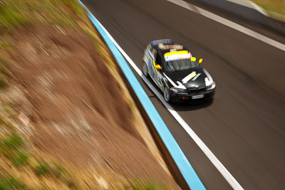 26;10-February-2013;26;Australia;BMW-130i;Bathurst;Bathurst-12-Hour;Daniel-Lewis;Daniel-Studdart;Forrests-Elbow;GWS-Personnel-Motorsport;Grand-Tourer;Jonathan-Venter;Mt-Panorama;NSW;New-South-Wales;auto;endurance;motion-blur;motorsport;racing;wide-angle