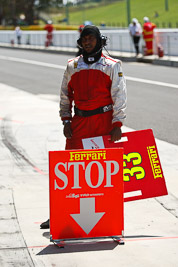 10-February-2013;Australia;Bathurst;Bathurst-12-Hour;Clearwater-Racing;Grand-Tourer;Mt-Panorama;NSW;New-South-Wales;atmosphere;auto;endurance;mechanic;motorsport;pitstop;portrait;racing;telephoto