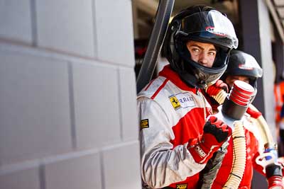 10-February-2013;Australia;Bathurst;Bathurst-12-Hour;Clearwater-Racing;Grand-Tourer;Mt-Panorama;NSW;New-South-Wales;Topshot;atmosphere;auto;endurance;fuel-man;mechanic;motorsport;pitstop;portrait;racing;telephoto