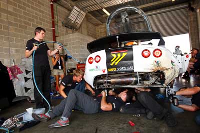 10;10;10-February-2013;Australia;Bathurst;Bathurst-12-Hour;Grand-Tourer;Lotus-Exige;Motionsport;Mt-Panorama;NSW;New-South-Wales;Simply-Sports-Cars;atmosphere;auto;crew;damage;endurance;group;motorsport;pitlane;racing;repair;team;wide-angle