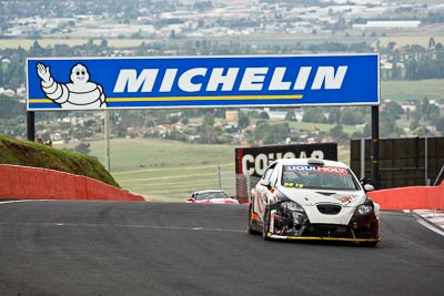 56;10-February-2013;56;Australia;Bathurst;Bathurst-12-Hour;Grand-Tourer;Kerry-Wade;Mark-Pilatti;Motorsport-Services;Mt-Panorama;NSW;New-South-Wales;Reid-Park;Seat-Leon-Supercopa;Simon-Piauaninj;auto;endurance;motorsport;racing;telephoto