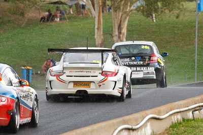 68;10-February-2013;68;Australia;Bathurst;Bathurst-12-Hour;Grand-Tourer;Jeff-Lowrey;Marcus-Mahy;Motorsport-Services;Mt-Panorama;NSW;New-South-Wales;Porsche-911-GT3-Cup-997;Reid-Park;Todd-Murphy;auto;endurance;motorsport;racing;rain;super-telephoto;wet