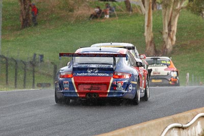 30;10-February-2013;30;Australia;Bathurst;Bathurst-12-Hour;Drew-Russell;Grand-Tourer;Hunter-Motorsports;Jonny-Reid;Mt-Panorama;NSW;New-South-Wales;Porsche-911-GT3-Cup-997;Reid-Park;Steven-Johnson;auto;endurance;motorsport;racing;rain;super-telephoto;wet