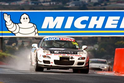 35;10-February-2013;35;Andrew-Bollom;Australia;Bathurst;Bathurst-12-Hour;Grand-Tourer;James-Parish;Mazda-RX‒7;Mazda-RX7;Mt-Panorama;NSW;New-South-Wales;Reid-Park;Ric-Shaw;Ric-Shaw-Racing;Stephen-Borness;auto;endurance;motorsport;racing;rain;super-telephoto;wet