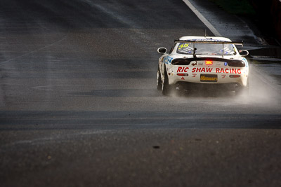 35;10-February-2013;35;Andrew-Bollom;Australia;Bathurst;Bathurst-12-Hour;Grand-Tourer;James-Parish;Mazda-RX‒7;Mazda-RX7;Mt-Panorama;NSW;New-South-Wales;Ric-Shaw;Ric-Shaw-Racing;Stephen-Borness;Sulman-Park;auto;endurance;motorsport;racing;rain;super-telephoto;wet