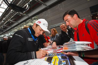 19-May-2013;24-Hour;Deutschland;Germany;Marcel-Fässler;Nordschleife;Nuerburg;Nuerburgring;Nurburg;Nurburgring;Nürburg;Nürburgring;Phoenix-Racing;Rhineland‒Palatinate;Ring-Boulevard;Topshot;atmosphere;auto;autograph;motorsport;paddock;portrait;racing;telephoto;wide-angle